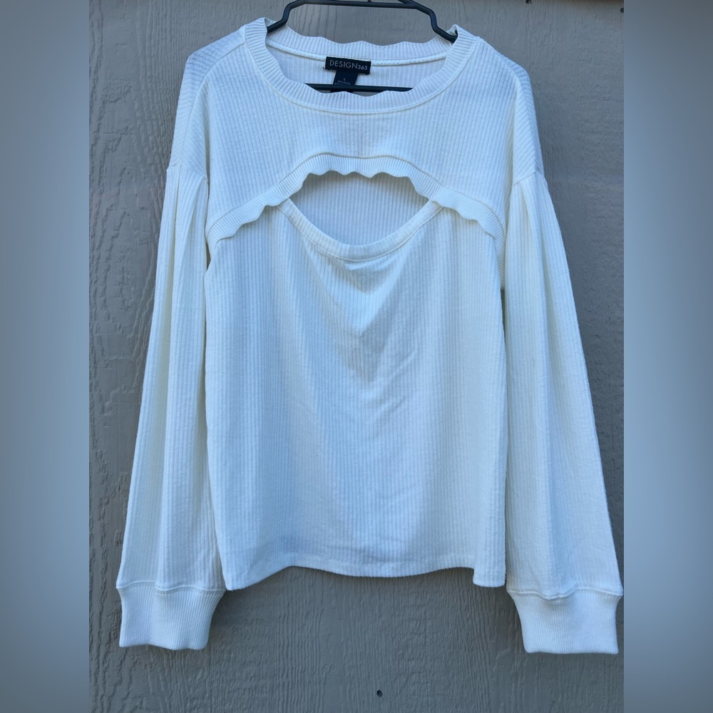 Woman’s cut out sweater size Large